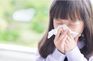 A girl having cold allergy