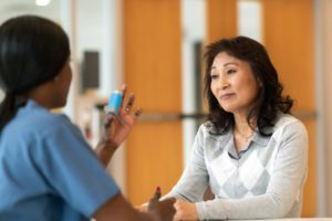 asthma doctor talking to patient