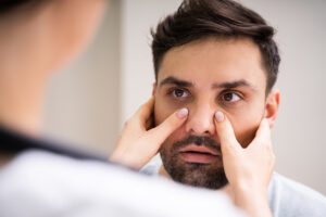 Physician Doctor Doing Sinusitis Examination